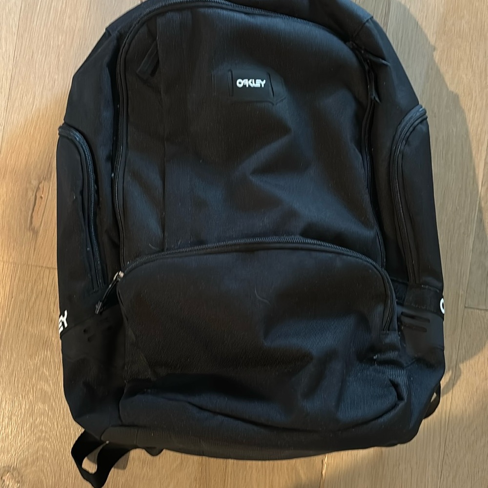 Oakley Back Pack. Brand New With Tags. Lots of great storage pockets!